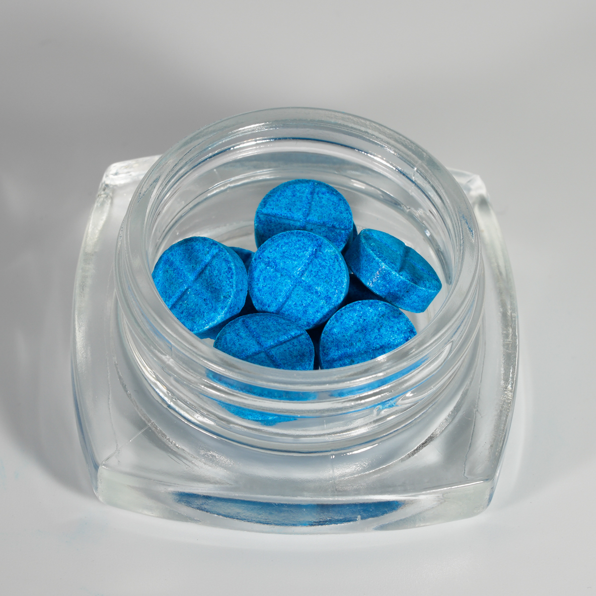 XUM DEEP Personal Pack chewable Miprocin tablets out of the jar